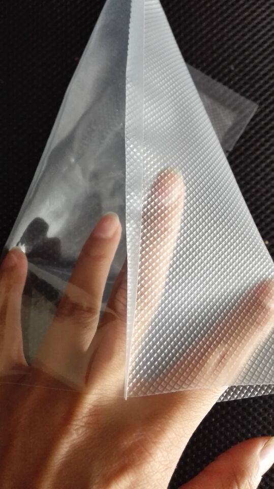 xinbaolong專門供應定做透明真空包裝塑料袋 易撕口食品級保鮮膜